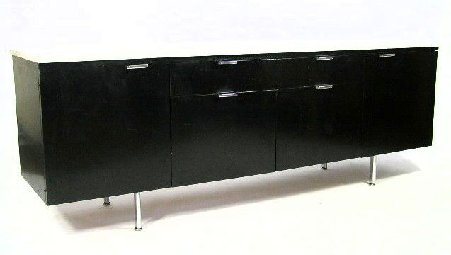 KNOLL CREDENZA - EBONY 4 POSITION- CHROME LEGS: FEATURES 11 DRAWERS ON MODERN HARDWARES SLIDERS - CHROME 6 LEG FEET - 26"X75"X18" - F358