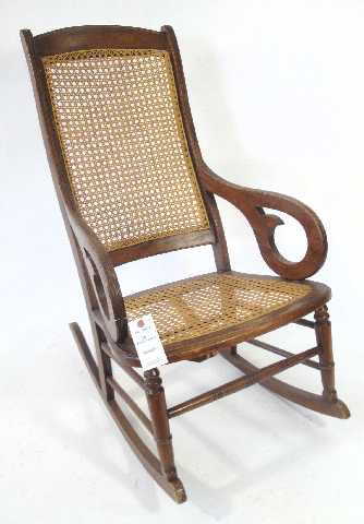 178: ANTIQUE CANE ROCKING CHAIR 178: ANTIQUE CANE ROCKING CHAIR. See Sold Price - 178: ANTIQUE CANE ROCKING CHAIR