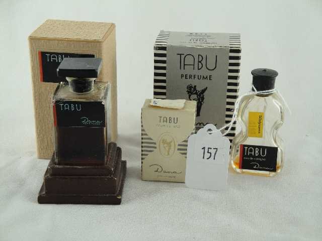 LOT OF 4 - DANA BOTTLES OF TABU: INCLUDING STRIPED BOX MEASURING 3.25", DANA 2" UNOPENED, DANA IN CELLO FORM MEASURING 3" AND DANA UNOPENED IN BOX MEASURING 3.75" TALL