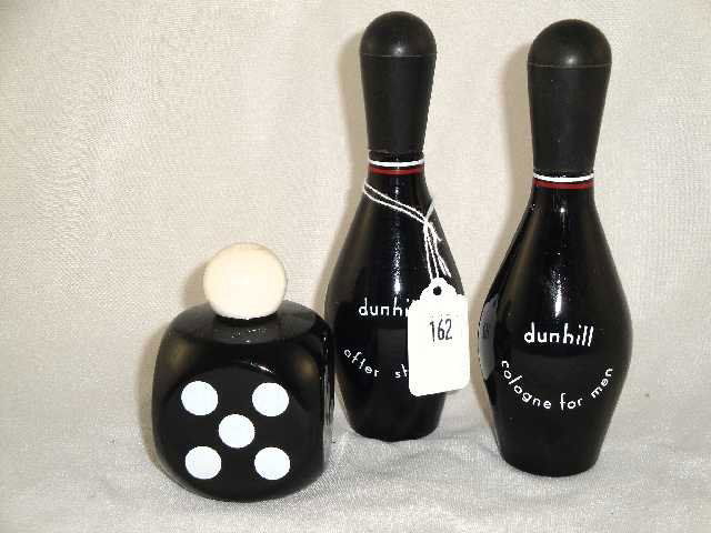 LOT OF 3 - DUNHILL BOTTLES: INCLUDING PAIR MEASURING 6.75" TALL AND DICE AFTERSHAVE MEASURING 3.5" TALL
