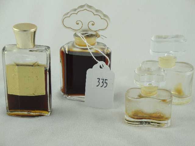 MISC LOT OF 4 - ESTE LAUDER BOTTLES: CINNABAR UNOPENED, 2 - WHITE LINEN, TALLEST MEASURES 4" - ALL ONE MONEY!