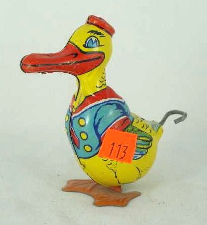 CHEIN DONALD DUCK TIN WIND UP TOY: TAIL IS KEY - MEASURES 4" TALL