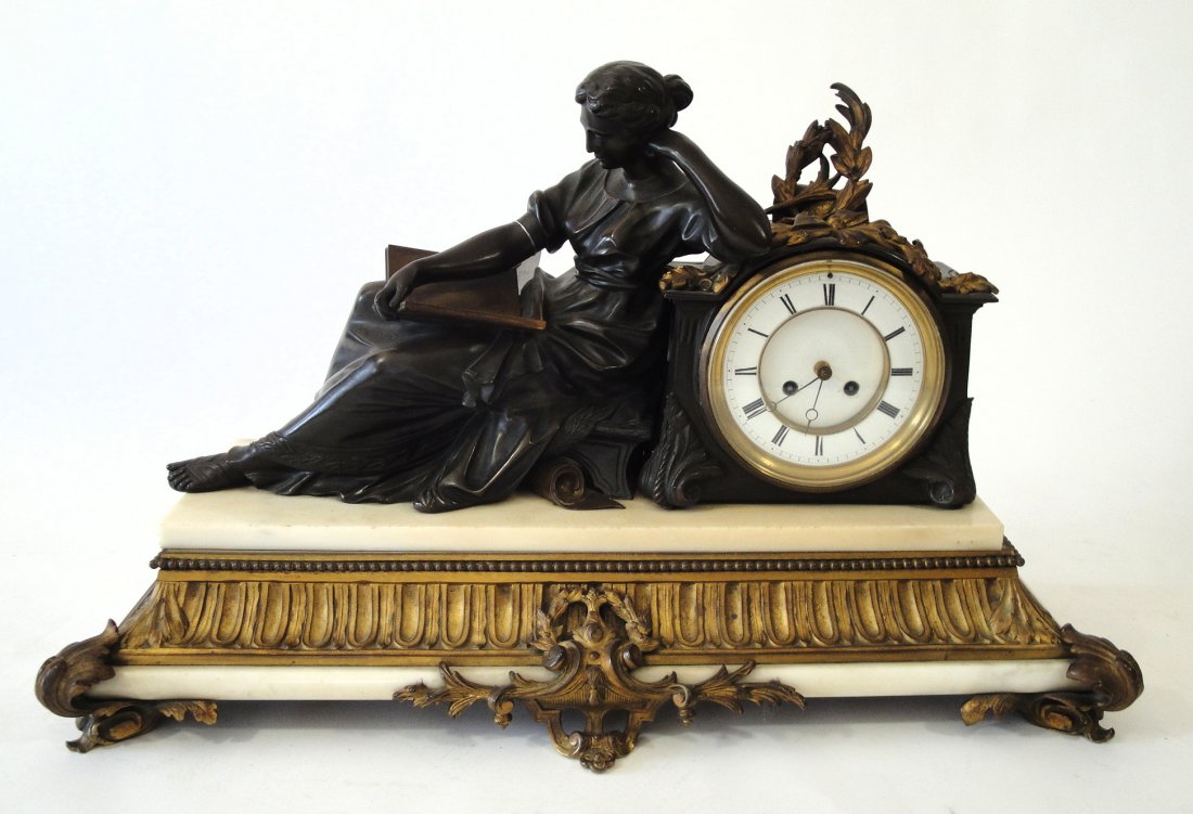 19TH C. FRENCH BRONZE FIGURAL CLOCK: FEATURING ORMOLU BRONZE GILT DETAILS AND MARBLE PLINTH DETAILS - MEASURES 18" X 26" X 10"