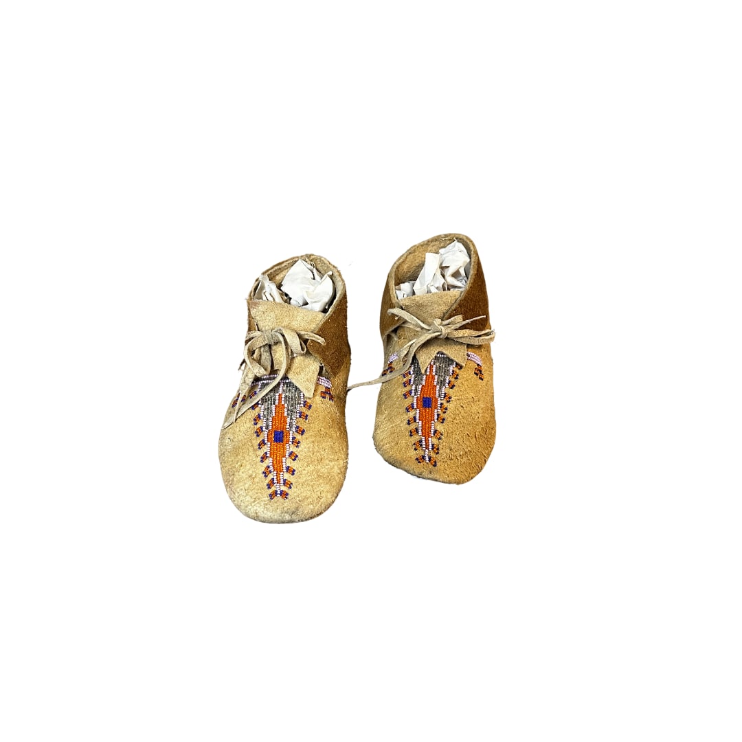 Vintage Native American Indian Moccasins: Vintage Native American Indian MoccasinsBlue/Orange/White Beading These moccasins are a beautiful representation of traditional craftsmanship, featuring soft, supple leather and meticulously hand-bead