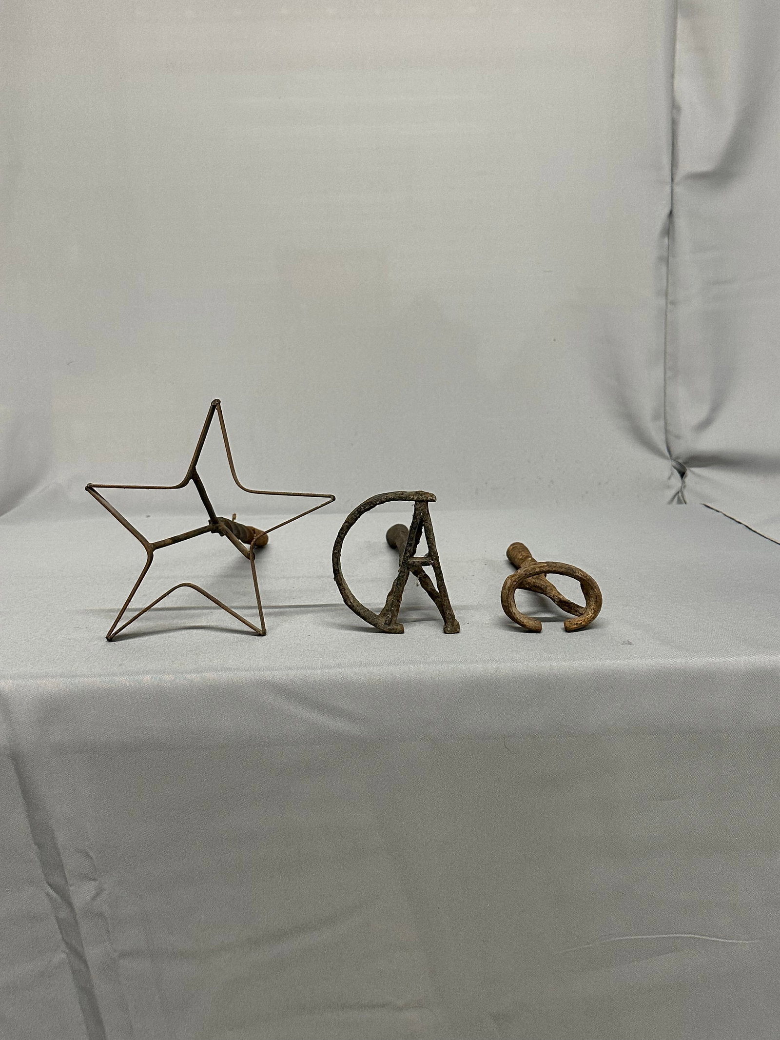 Collection of (3) Branding Rod Irons- Star, AD, C: Collection of (3) Branding Rod Irons These irons, once used to mark livestock, feature different brands and wear, telling a story of years gone by. Perfect for collectors, historians, or as a rustic a