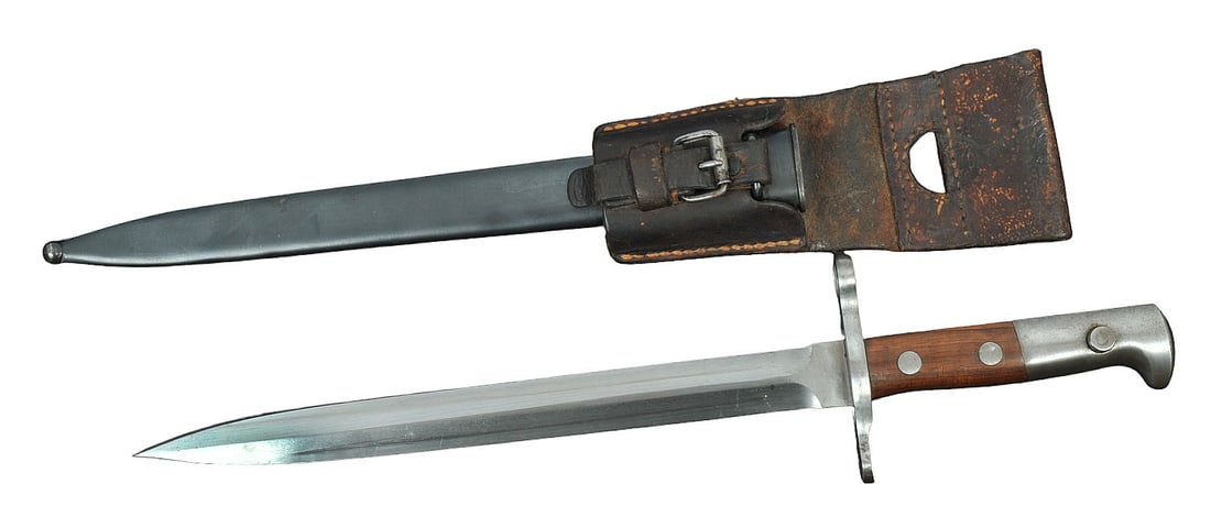 Swiss Military Schmidt-Rubin K-31 Rifle Bayonet (VDM): This Swiss Military Schmidt-Rubin K-31 Rifle Bayonet is in very good condition with scabbard and frog.