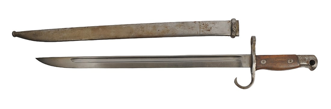 Imperial Japanese Military WWII era Type 30 Arisaka Rifle Bayonet (J2D): This Imperial Japanese Military WWII era Type 30 Arisaka Rifle Bayonet is in good condition, but missing the locking button. It was produced by Tokyo Arsenal.
