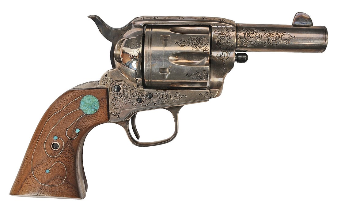 Engraved Uberti M1873 Cattleman 'Sheriff' 45 LC Revolver FFL Required: 88619 (J2D1): An Engraved Uberti M1873 Cattleman 'Sheriff' 45 LC Revolver that is in good condition with a bright and defined bore but needs a light cleaning. The action appears to function properly with a tight lo