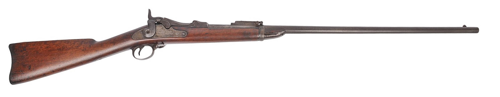 U.S. Springfield Trapdoor M1884 45-70 Rifle Sporterized No FFL Required (C4H1): A U.S. Springfield Trapdoor M1884 45-70 Rifle that has a dark bore with moderate rifling and pitting. The action appears to function properly with good hammer lock up and prominent wear on the finish.