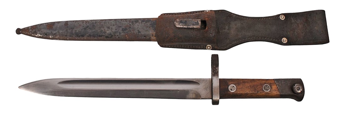 Austrian Military World War I Steyr M1895 Rifle Bayonet & Frog (CWA): Austrian Military World War I era Steyr M1895 Rifle Bayonet and frog. Bayonet is in good condition with light rust on the scabbard.
