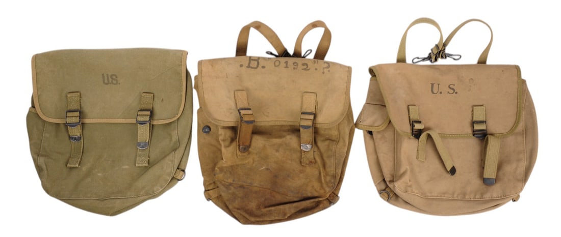 US Military World War II M1941 Airborne Musette Bag Lot of 3 (C4P): US Military World War II M1941 Airborne Musette Bag Lot of 3. One is British Made in the transitional Khaki/ Green color. Two are US made.