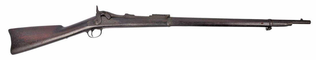 Springfield Model 1884 45-70 Gov't Trapdoor Rifle No FFL Required (HHS1): A Springfield Model 1884 45-70 Gov't Trapdoor Rifle that is in fair condition with a bright and defined bore that needs a light cleaning. The action appears to function properly, and the finish shows