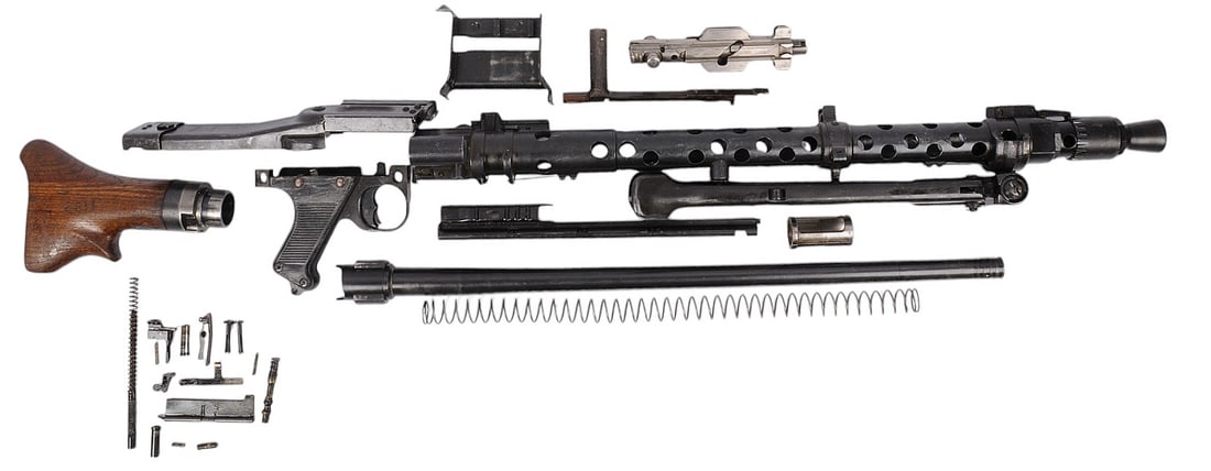 *German WWII MG34 7.92x57mm Machine Gun Parts Kit (J): A 1944 Dated German WWII MG34 7.92x57mm Machine Gun Parts Kit in very good condition, the kit also comes with an original barrel that bears German proof marks on the underside. This kit has been de-mi