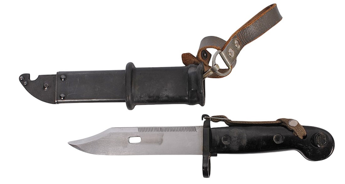 East German Mpi-km AK47 Bayonet (A2L): An East German MPI-KM AK47 Bayonet that is in very good condition with a non-matching scabbard and a retention strap.