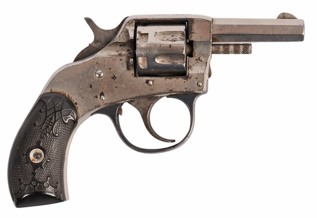 Harrington & Richardson Young American .32 S& W Double-Action Revolver - FFL # 35637 (A1): A nickeled Harrington & Richardson Young American .32 S& W Double-Action Revolver in good condition with a slightly dark but defined bore. The action appears to function properly, but the lockup is ra