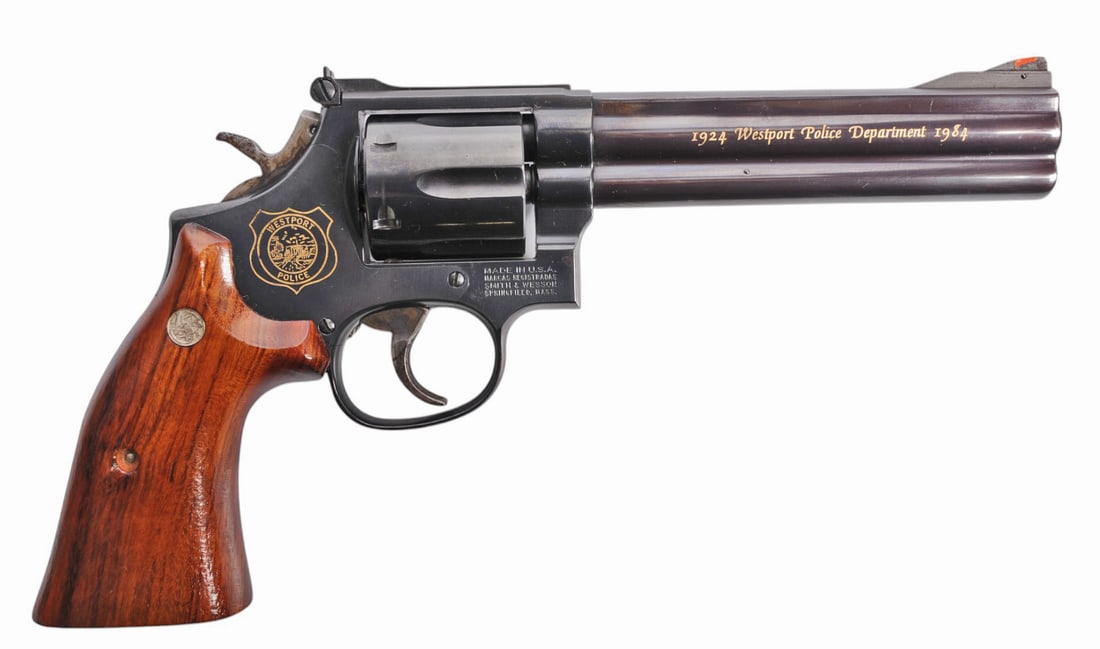 Smith and Wesson Model 586 .357 Mag Westport Police 1 of 40 Revolver FFL Required: AFV8313 (M2A1): A Smith and Wesson Model 586 .357 Mag Westport Police 1 of 40 Engraved Revolver that is in good to very good condition with a bright and defined bore that needs a light cleaning. The action appears to