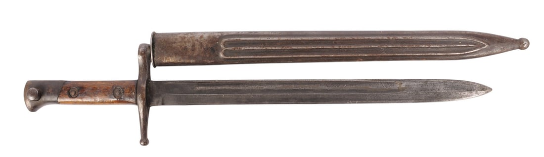 Italian Military WWI-II era M-1891 Carcano Rifle Bayonet (S4C): An Italian Military WWI-II era M-1891 Carcano bayonet with a rare fluted scabbard variation. It is in good to very good condition.