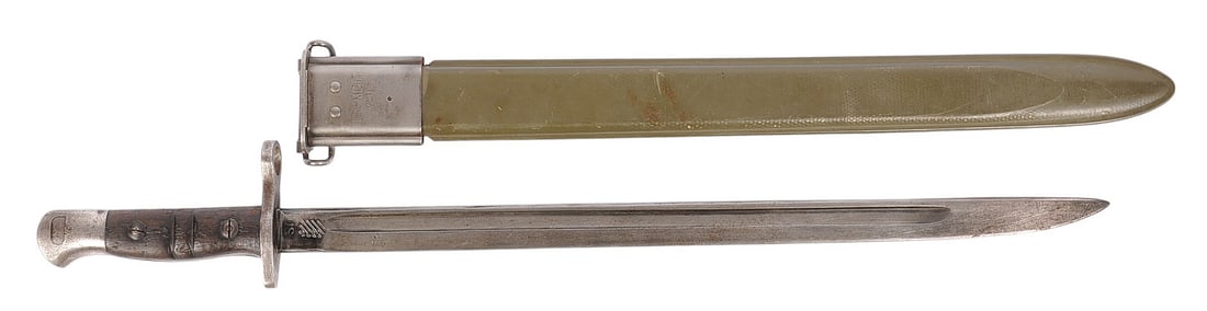 US Military WWI M1917 Enfield Rifle Bayonet in a Vietnam Era M1917 Scabbard (M2T): US Military WWI era P-14/M1917 Enfield Rifle Bayonet in a Vietnam Era M1917 Scabbard is in good to very good condition.