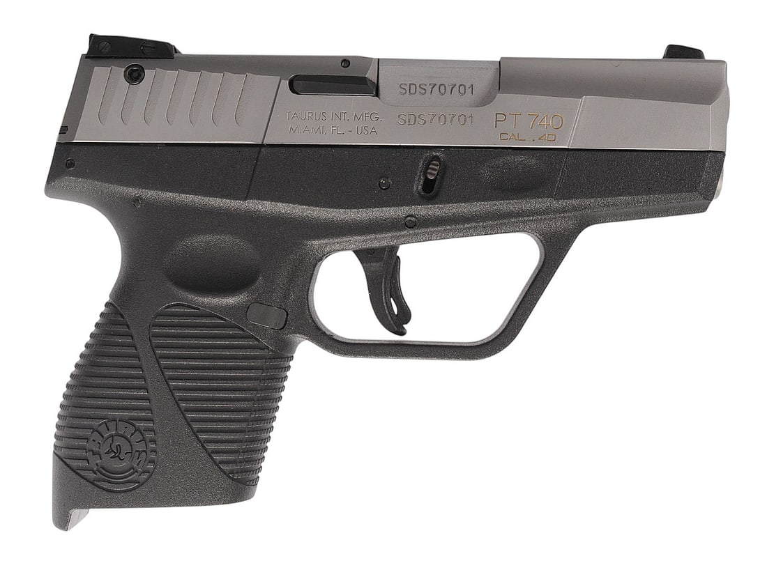 Taurus Slim PT 740 40 S&W. Semi-Auto pistol FFL:SDS70701 (W2R1): A Taurus Slim PT 740 40 S&W. Semi-Auto pistol in very good condition with a bright and defined bore. The action appears to function properly with minor wear to the finish. The pistol does not include 