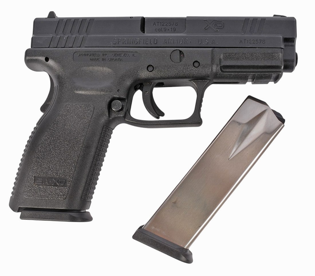 Springfield XD-9 9mm Semi-Auto Pistol FFL:AT122578 (GW1): A Springfield XD-9 9mm Semi-Auto Pistol in very good condition with a bright and defined bore. The action appears to function with little to no wear on the finish. The pistol comes with one extra maga
