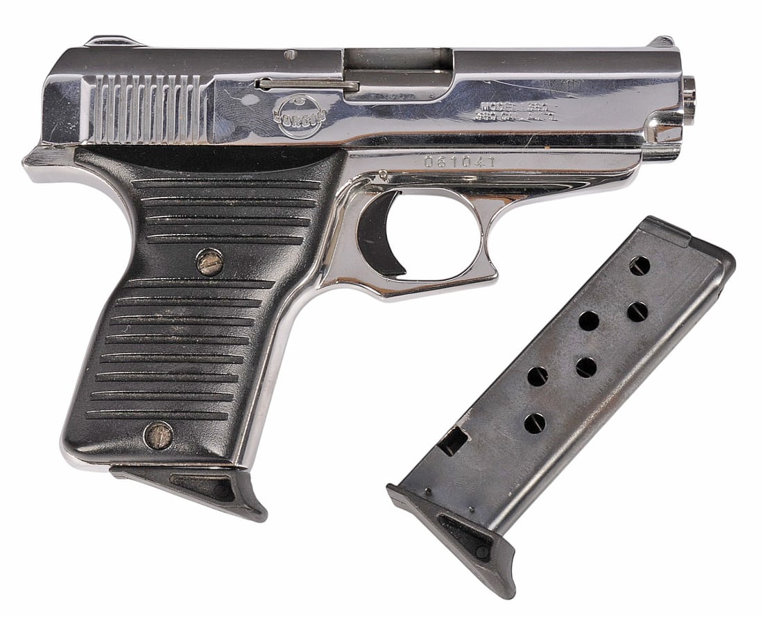 Lorcin Nickel 380 ACP. Semi-Auto Pistol FFL Req:#061041(HJJ1): A Lorcin Nickel 380 ACP. Semi-Auto Pistol in very good condition with a bright and defined bore. The action appears to function properly with very little to minor wear to the original high polish nick