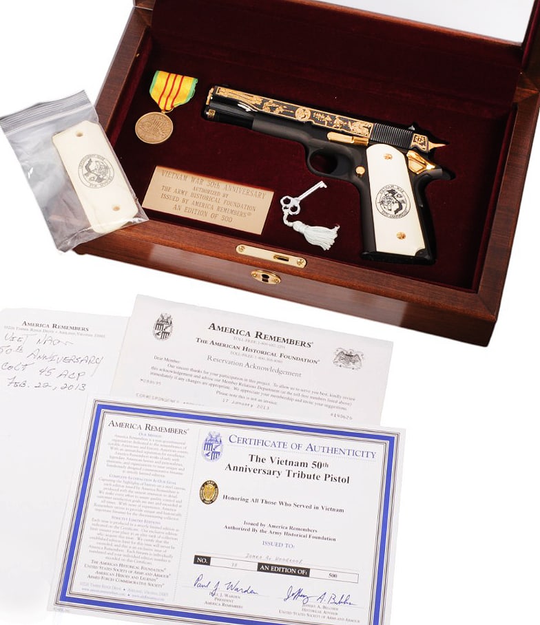 A Vietnam 50th Anniversary Tribute M1911A1 45 ACP Semi Auto Pistol 1 of 500 FFL Req:2850902(WJA1): A Vietnam 50th Anniversary Tribute 1 of 500 M1911A1 45 ACP Semi Auto Pistol with Display Case and Certificate of Authenticity in very good condition. The action has not been tested due to preserving t