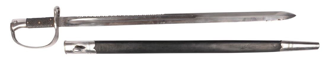 Rare Unauthenticated British Military M1879 Sawtooth Martini-Henry Sword Bayonet (J): A Rare Unauthenticated British Military M1879 Sawtooth Martini-Henry Sword Bayonet in very good condition with a very good scabbard. Markings might indicate colonial production/use.