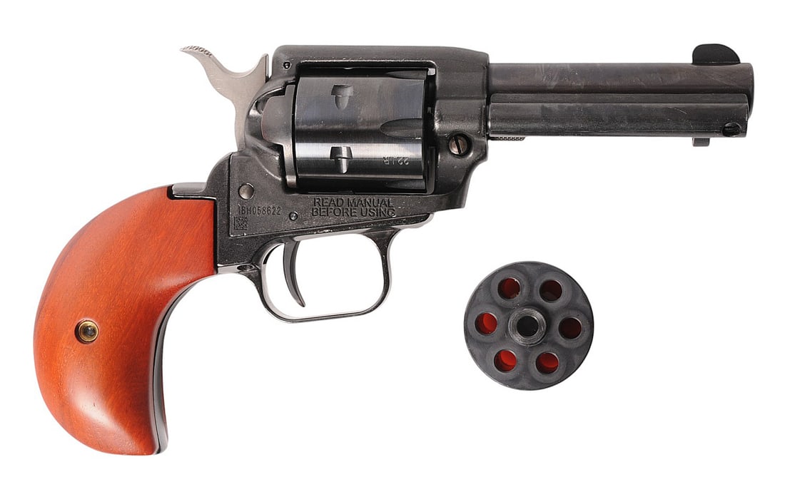 Heritage Arms Birds Head Frame 22LR./22 Mag Single Action Revolver FFL #1BH058622 (BRA1): A Heritage Arms Birds Head Frame 22LR. Single Action Revolver with a 22 Mag Cylinder in very good condition with a bright and defined bore. The action appears to function properly with little to no we