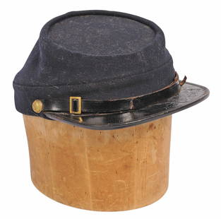 Rare US Civil War Original Union Enlisted Kepi (C2M): A Rare US Civil War Original Union Enlisted Kepi In good condition. The kepi has good stitching with minor wear for its age. The interior liner is torn but maintains legible markings with good color t