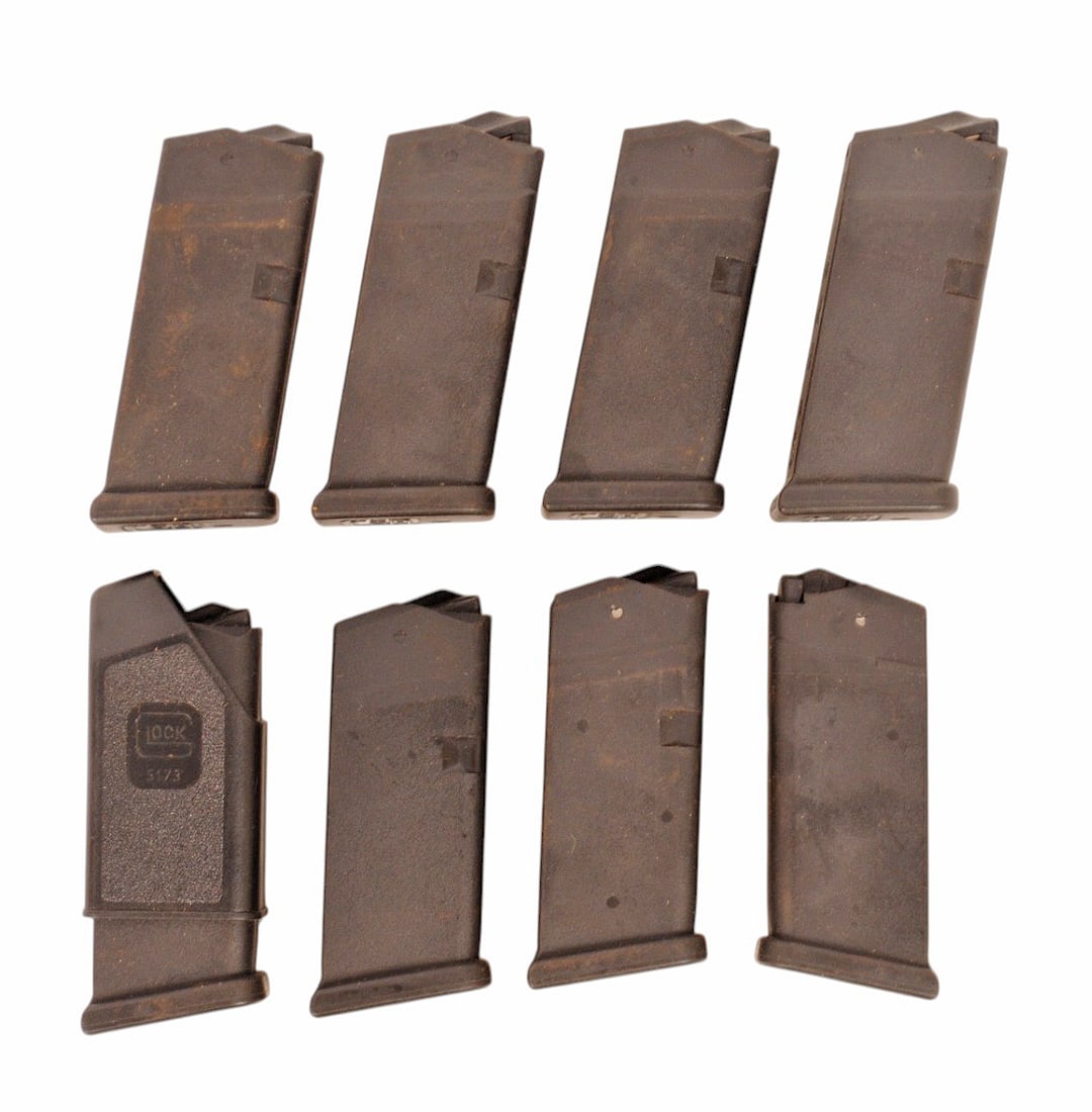 Glock G29 10MM Subcompact 10Rd. Magazine Lot of 8 with Speed loader (SAK): A Glock G29 10MM Subcompact 10Rd. Magazine Lot of 8 with Speed loader in good to very good condition. All magazines have minor wear to the exterior body and retain good follower spring tension.