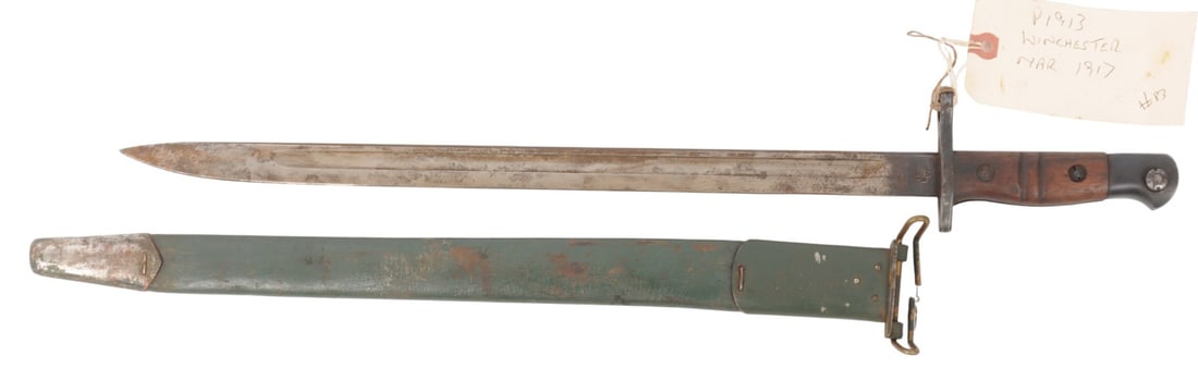 US Military WWI Winchester P1913 Bayonet with Original Scabbard (E2N): A US Military WWI Winchester P1913 Bayonet with Original Scabbard in good to very good condition with minor wear and surface rust to the original blade finish. Designed much like the Pattern 1907 swor
