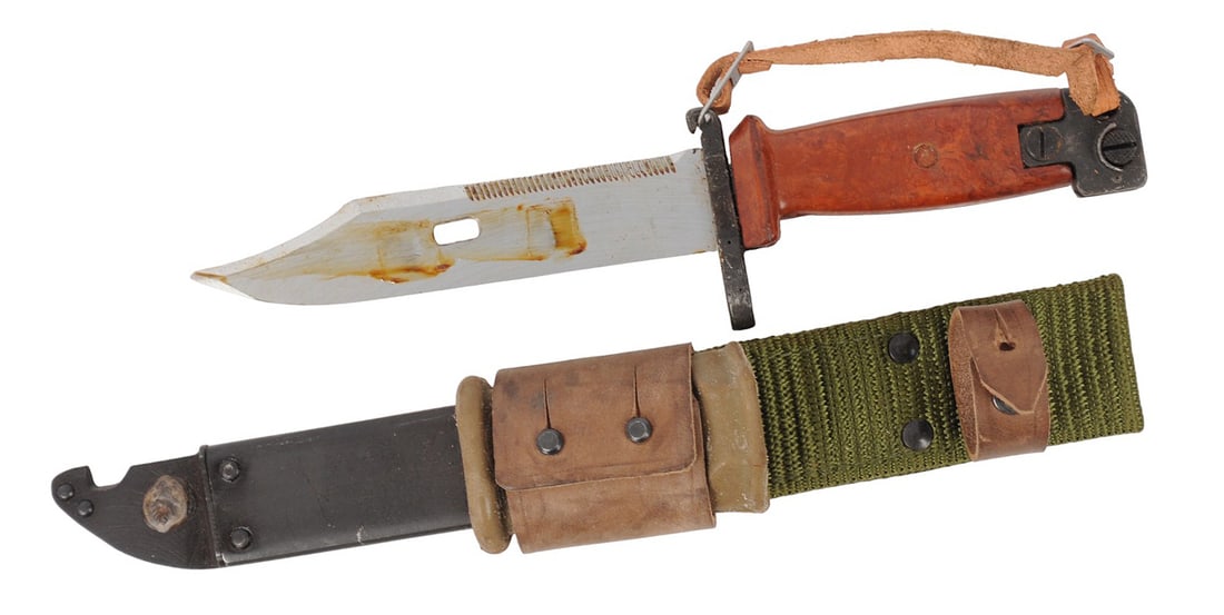 Cold War Romanian Military Md.86 AIMS-74 Cugir Bayonet (CWA): Cold War Romanian Military Md.86 Cugir Bayonet. This is the most modern variation of the Romanian bayonet. Made for the Md.86 (AIMS74) it will also fit on any AKM. This uncommon bayonet is in very goo