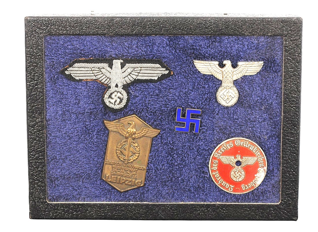 *German WWII Party and Police Insignia & Day Badge Group Lot of 5(A): A grouping of original *German WWII-era insignia and badges in good condition. Lot includes: NSDAP Political Eagle Cap Badge: Die-struck zinc eagle clutching swastika, with rear prongs intact. Waffenr