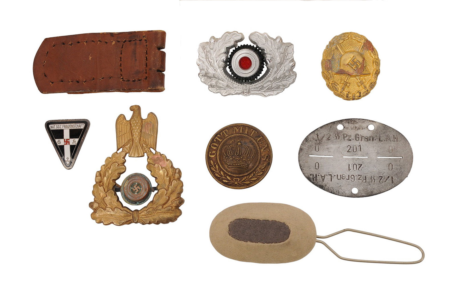 *German WWII Insignia, Badges, and SS Identification Disc Lot of 8(A): A mixed grouping of original *German WWII insignia, badges, and field equipment components, highlighted by a scarce SS Panzergrenadier “Leibstandarte Adolf Hitler” Erkennungsmarke (ID Disc