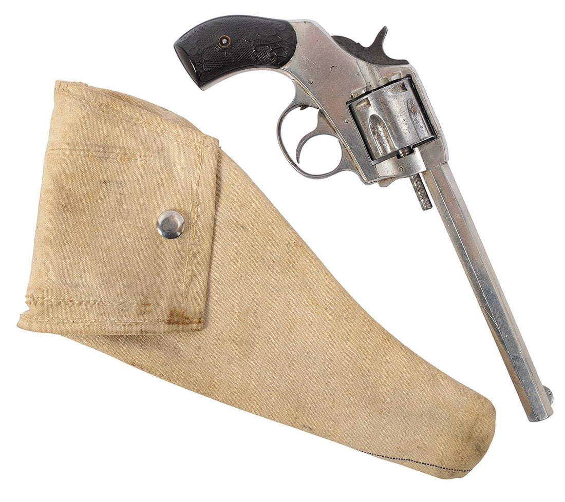 Harrington & Richardson 'The American' .32 S&W Revolver FFL Required NSN (Q2K): A Harrington & Richardson 'The American' .32 S&W Revolver that is in good condition with a slightly dark but defined bore. The action appears to function properly, and the finish shows mild usage wear