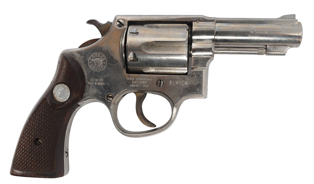 Brazilian Taurus Nickeled 38 SPL Double Action Revolver FFL 614114 (A1): A Brazilian Taurus Nickeled 38 SPL Double Action Revolver in good condition with a bright and defined bore but needs light cleaning. The action appears to function properly with some cosmetic wear to