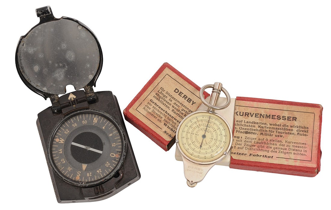 *German WWII Marching Compass and “Derby” Map Distance Meter Lot of 2(C3T) (C3T): A *German WWII Marching Compass and “Derby” Map Distance Meter Lot of 2 in good condition. Grouping includes: German WWII Military Marching Compass (Marschkompass): Black bakelite case wit