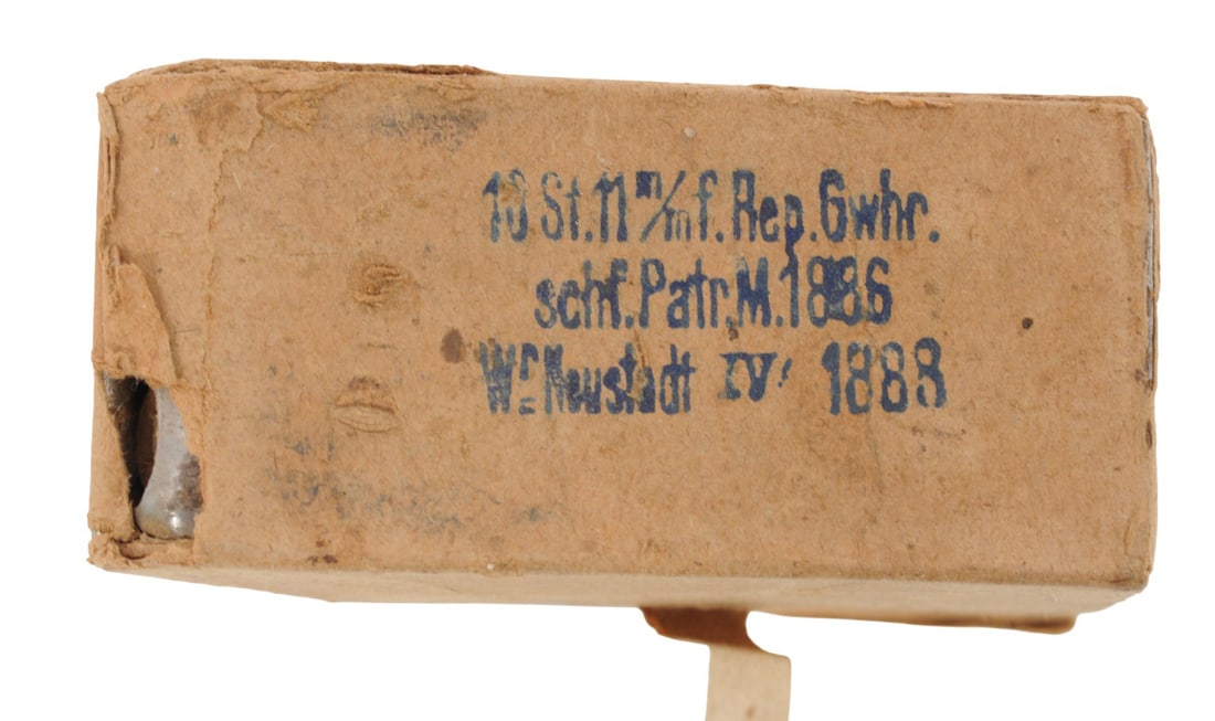 Original German 1888 Dated 11mm Mauser Box of 10Rds. on Stripper Clips(HKB): An Original German 1888 Dated 11mm Mauser Box of 10Rds. on Stripper Clips in good to very good condition. The box has been opened and unsealed. 
