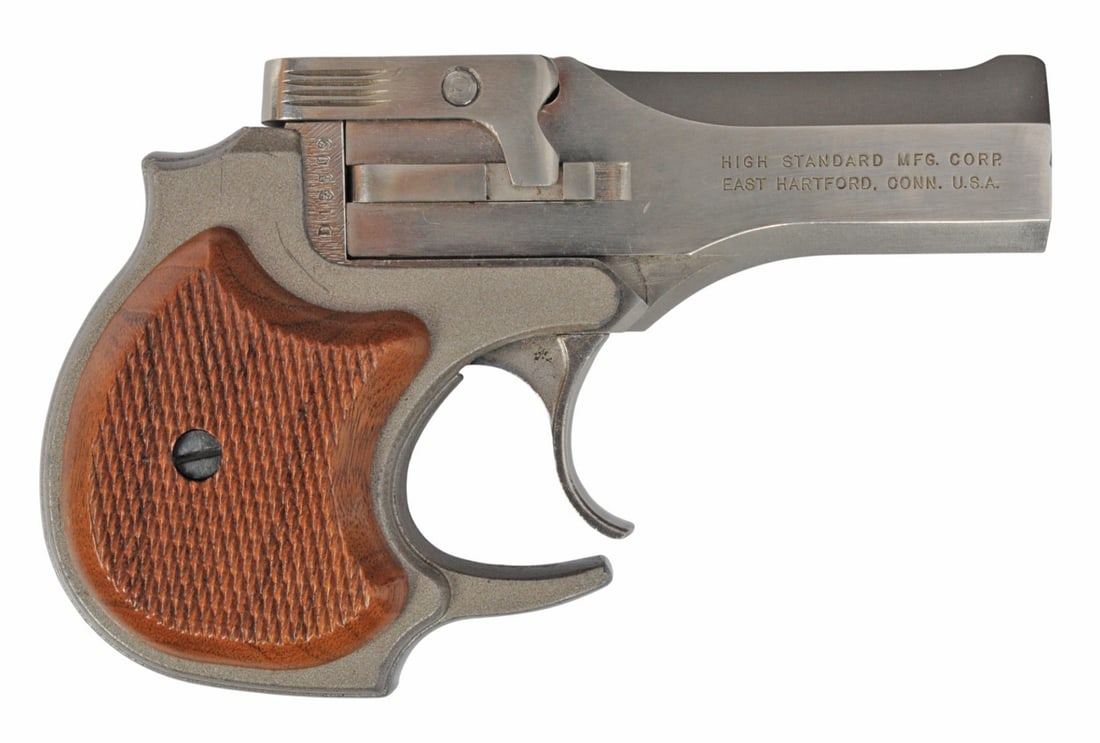 High Standard Derringer .22 Magnum Break-action Pistol FFL Required: D18509 (JGD1): A High Standard Derringer .22 Magnum Break-action Pistol that is in very good condition with two bright and defined bores. The action appears to function properly, and the finish shows light usage