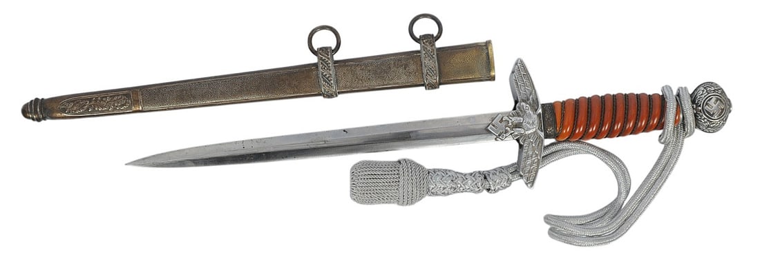 German WW2 Second Pattern Luftwaffe Dress Dagger (D4J): A German WW2 Second Pattern Luftwaffe Dress Dagger that is in good condition with light areas of wear on the blade. Comes with its silver tassel. 