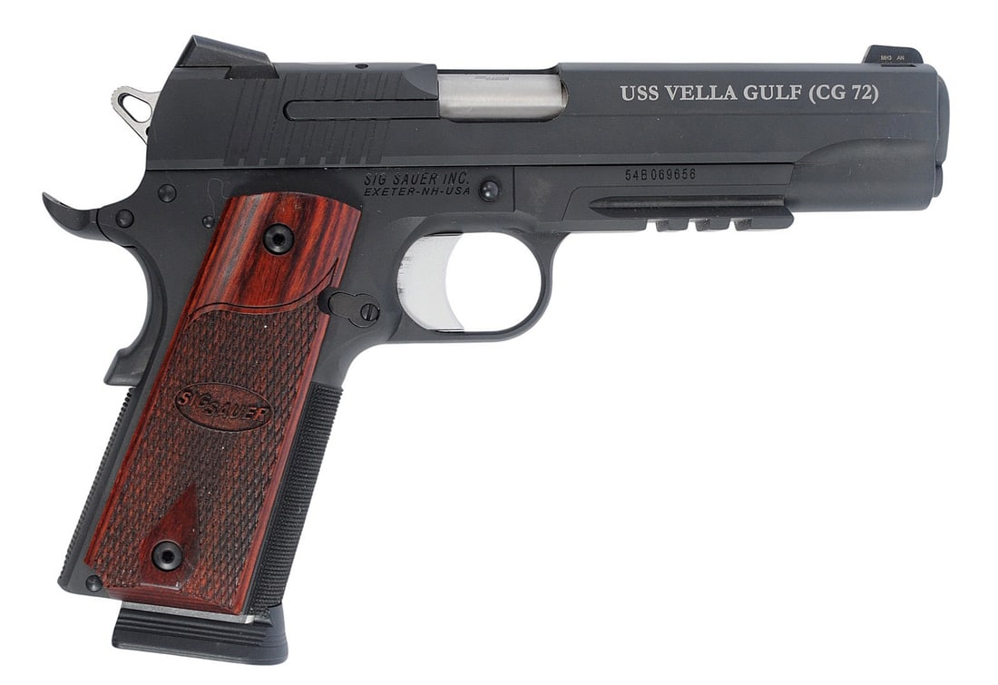 US Navy USS Vella Gulf (CG-72) Presentation Sig-Sauer M-1911 .45 ACP Pistol - #54B069658 (A1): A rare one of 30 US Navy USS Vella Gulf (CG-72) Presentation commemorative engraved Sig-Sauer M-1911 .45 ACP Semi-Automatic Pistol in like new condition. Standard Sig Pistol engrave with the cruisers