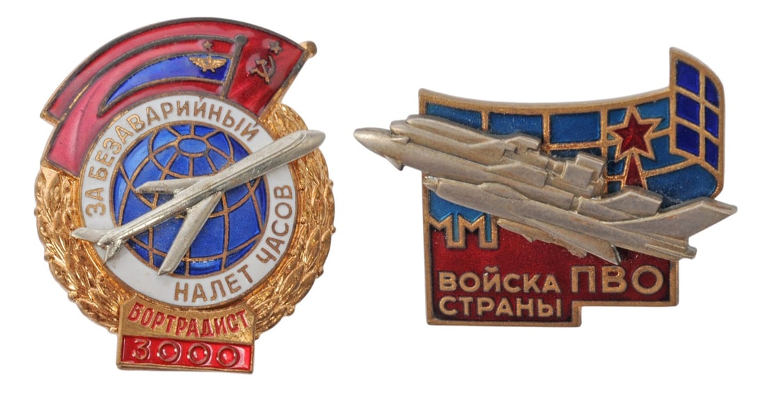 Two Soviet Air Force Aviation Badges (A): The first is the rare Soviet Air Force "For Accident-Free Flight Hours / Flight Radio Operator — 3000 Hours" for achieving a major milestone of 3,000 accident-free flight hours - a significant a