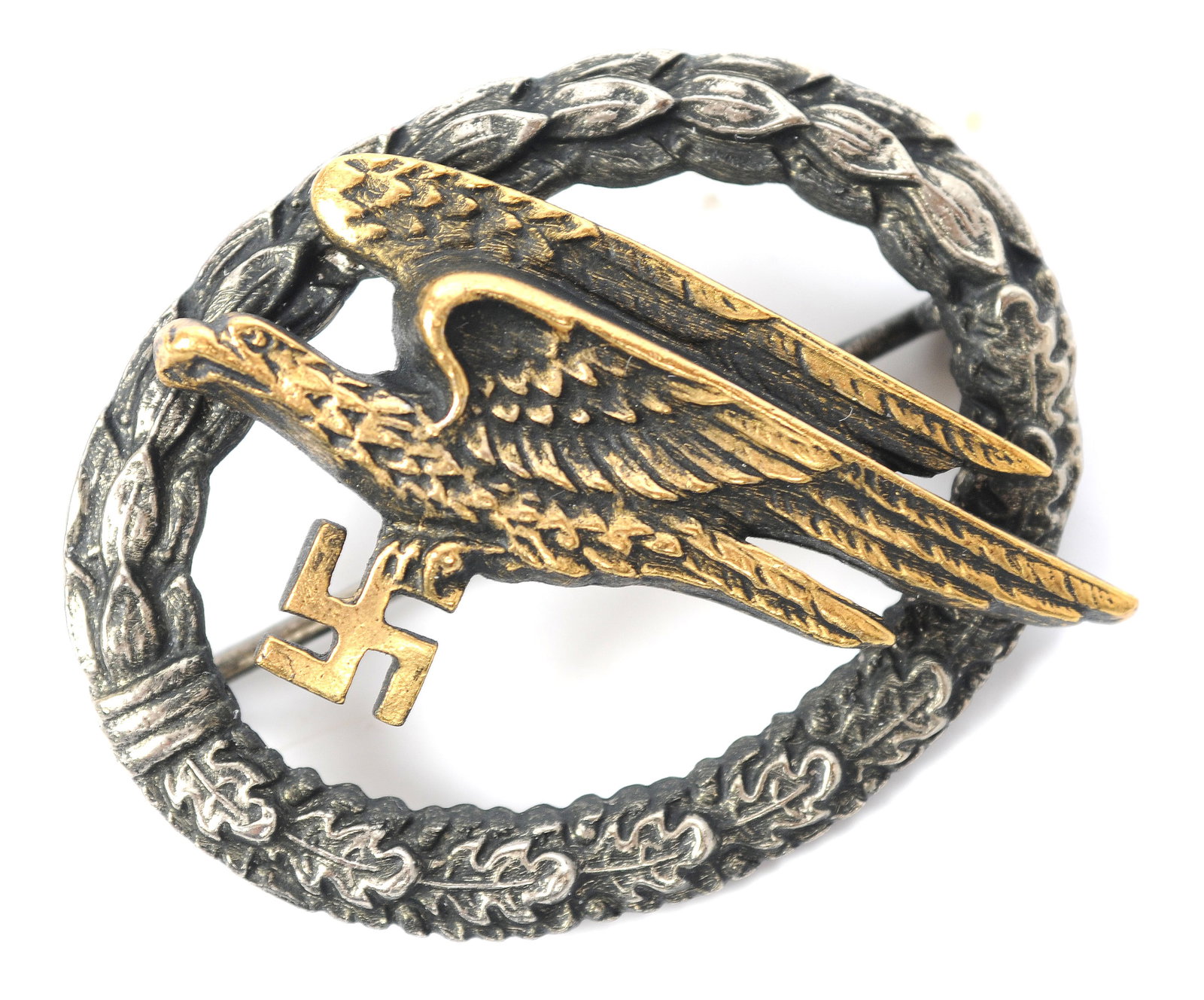 Early BSW *German World War II Luftwaffe Fallschirmjager Badge (CWA): Early BSW German World War II Luftwaffe Fallschirmjager Badge. This original badge has the clover shaped BSW makers mark. *Due to Proxibids/Live auctioneers new payment processor, Payrix, having