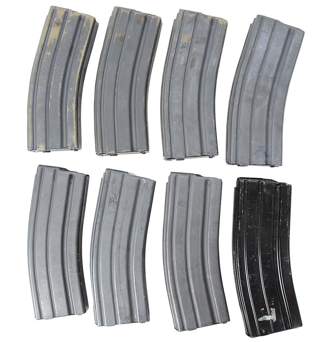 Surplus 30 Round 5.56 AR15 Magazines Lot of 8(JGD): A lot of Eight Surplus 30 Round 5.56 AR15 Magazines that are in good condition with most of them having military green followers.
