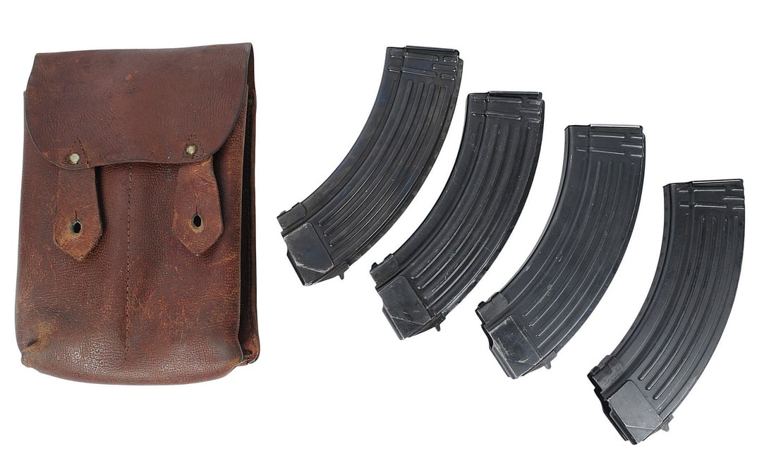 Romanian Surplus AK47 7.62x39mm 30 Rd Magazine Lot of 4 with Original Pouch (JGD): A Romanian Surplus AK47 7.62x39mm 30 Rd Magazine Lot of 4 with Original Pouch in good to very good condition.