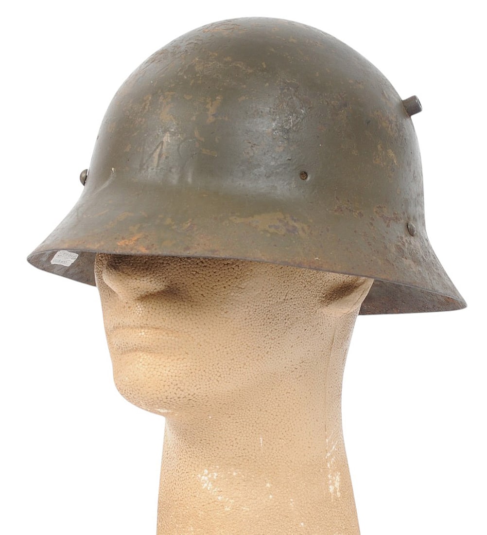 Spanish Civil War "Republican" Czech M30 Helmet (BM): A Spanish Civil War "Republican" Czech M30 Helmet in good to very good condition. The helmet maintains good original paint with a nice chin strap but is missing the liner. The Czech M30 helmet was a