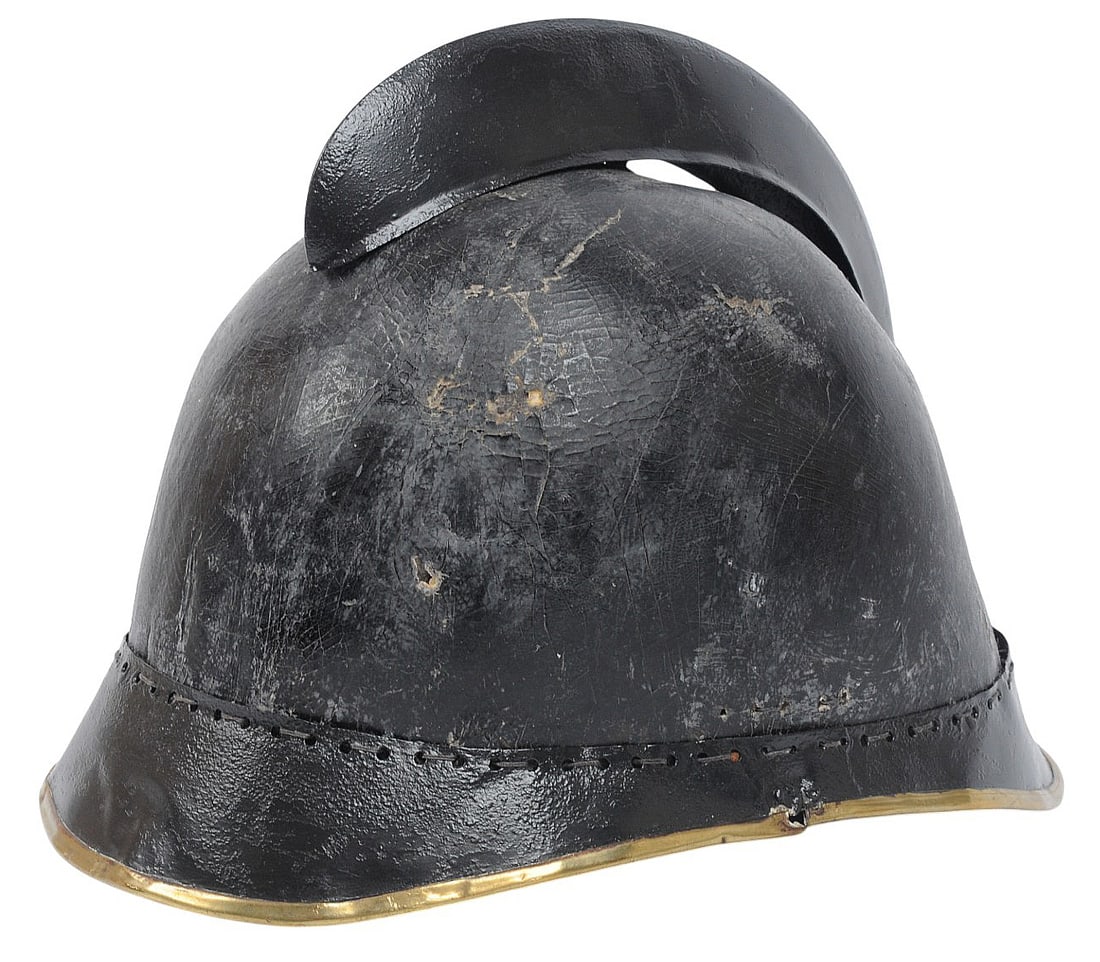 Imperial German WWI Pickelhaube Fire Helmet(C3T): An Imperial German WWI Pickelhaube Fire Helmet in good condition with the original liner. The liner and leather helmet exterior has some damage and is split in the back. The liner and helmet have very