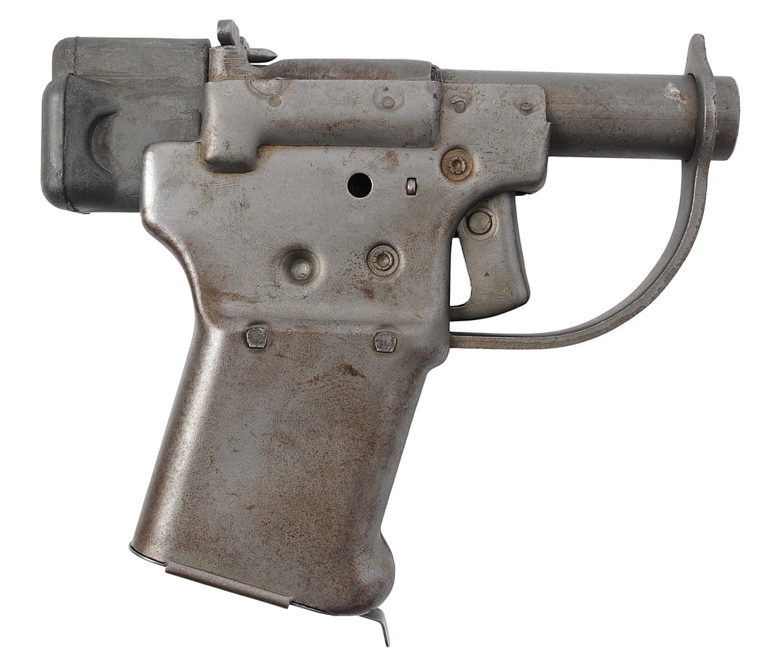 RARE US WWII issue General Motors Guide Lamp "Liberator" 45 ACP Single Shot Pistol - FFL NSN (A1): A super-RARE US WWII issue General Motors Guide Lamp "three-hole" Liberator .45 ACP Single Shot Pistol in very good condition with a bright smooth bore. The action appears to function properly with so