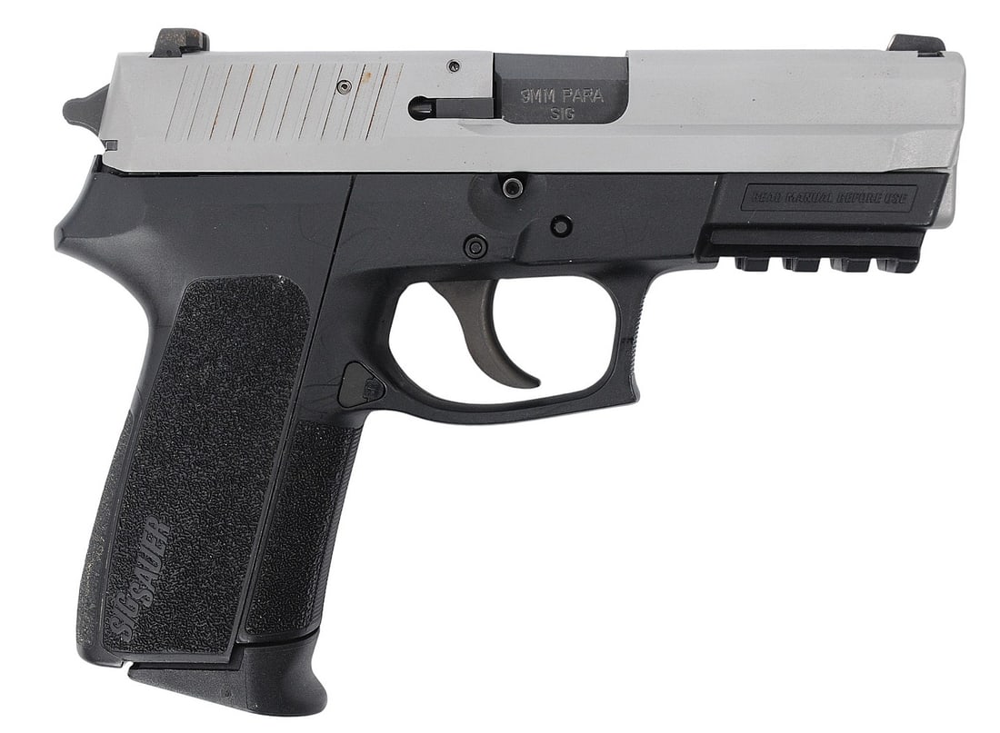 Sig Sauer SP2022 9mm Semi-auto Pistol FFL Required: 24B149117 (M2P1): A Sig Sauer SP2022 9mm Semi-auto Pistol that is in good to very good condition with a bright and defined bore. The action appears to function properly, and the finish shows light usage wear that can b
