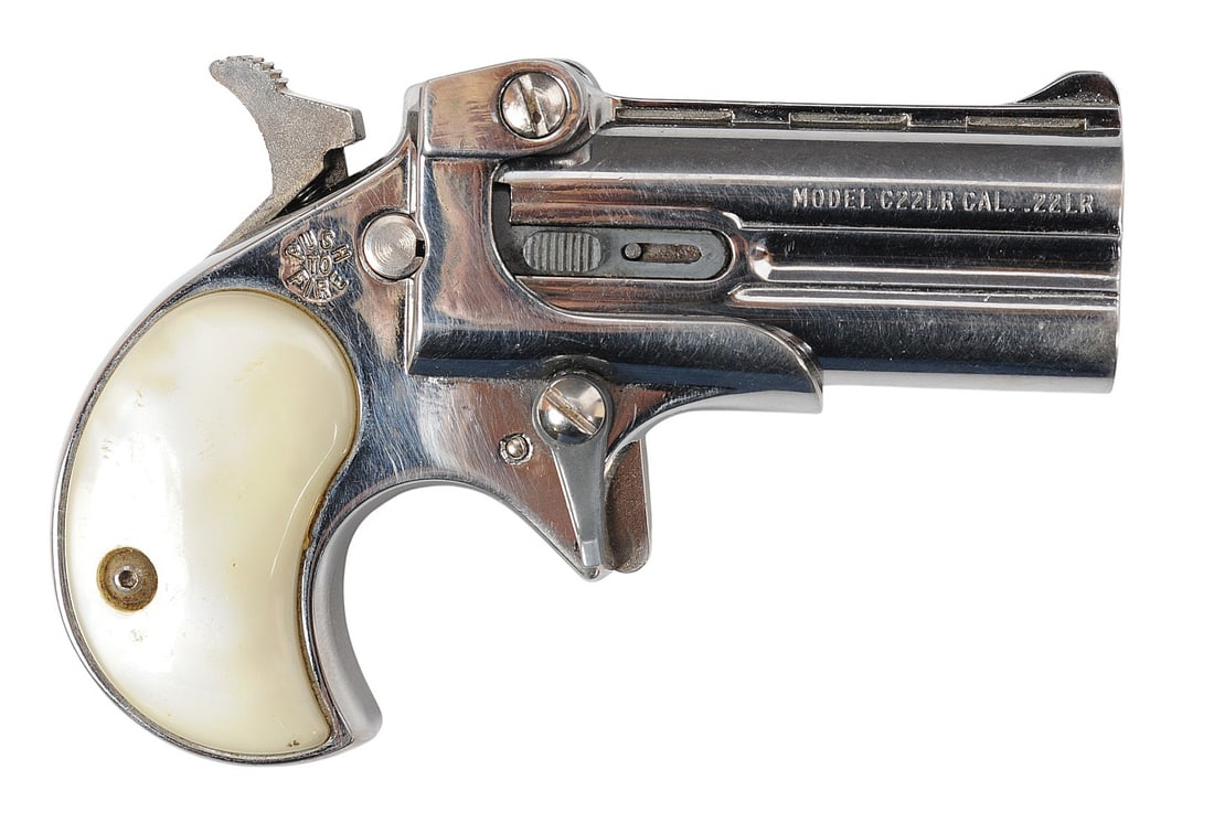 Cobra Enterprises Model C22 22LR Break Action Derringer FFL 032987 (A1): A Cobra Enterprises Model C22 22LR Break Action Derringer in good to very good condition with a bright and defined bore but needs light cleaning. Then action appears to function properly with some
